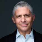 Portrait of Joshua Colangelo-Bryan, human rights lawyer and author, board member at Humanitas Media
